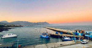 New Harbour in Hermanus at sunset, popular for whale watching boat tours